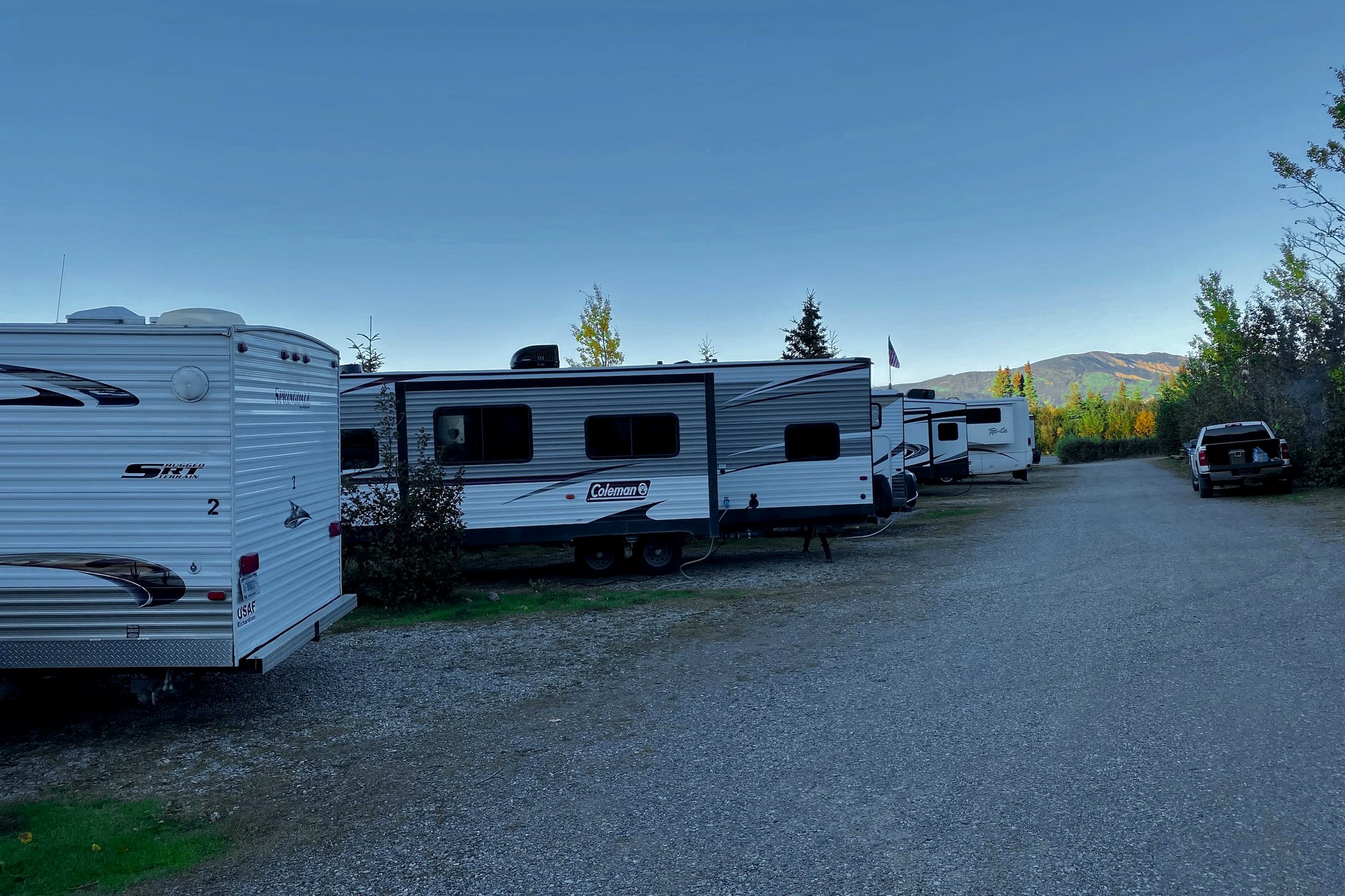 RV sites and mountain backdrop at Denali Hotel & RV Village in Healy, Alaska