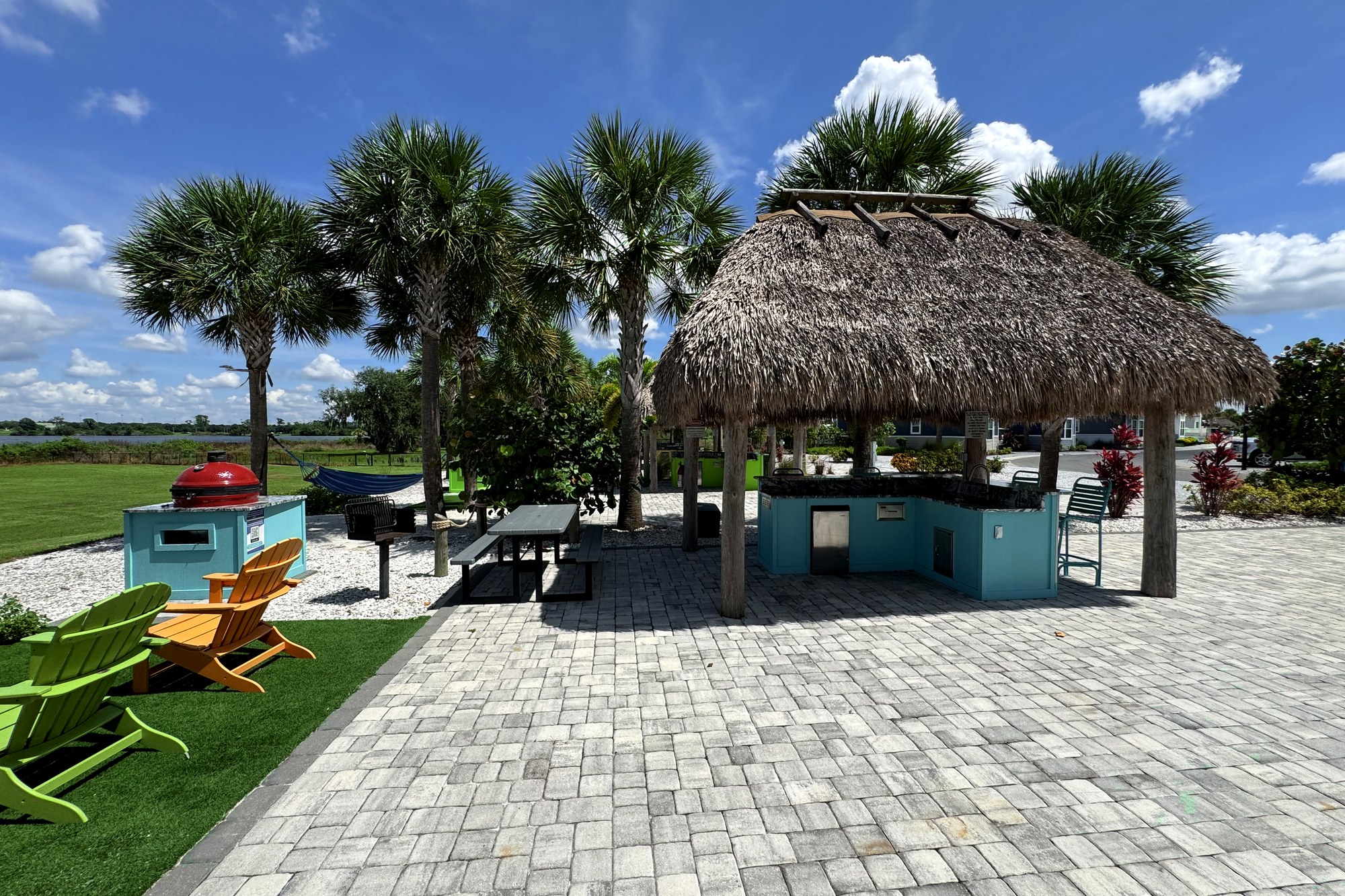 Open-air tiki bar and lounge seating at Camp Margaritaville RV Resort